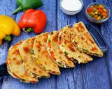 A picture of step 10 of Veggie Loaded Mini Quesadillas.