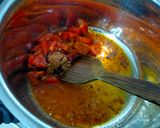 A picture of step 2 of Potato-Brinjal Curry.