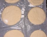 A picture of step 3 of Chocolate icing doughnuts.