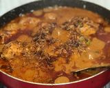 A picture of step 12 of Spicy Walnuts Masala Chicken Curry.