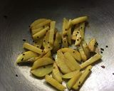 A picture of step 2 of Onion Flower Stalks dry Curry.