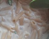 A picture of step 4 of Volcanic chicken with white sauce pasta.
