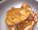A picture of step 4 of Achari chicken broast.