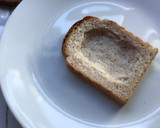 A picture of step 1 of Egg toast with a twist 🍳 🍞.