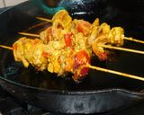 A picture of step 4 of Paneer Tikka with colorful veggies.