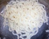 A picture of step 2 of Plain white sauce pasta 🍝 with fries 🍟.