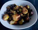 A picture of step 4 of My Roasted Sprouts in orange,crushed Walnuts and Cranberry sauce.