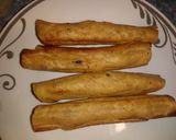 Foto del paso 5 de la receta: Taquitos de pollo ahogados en caldillo