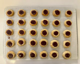 A picture of step 8 of Hazelnut Thumbprint Cookies.