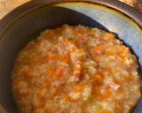 A picture of step 1 of Congee with Carrot and Sausage.