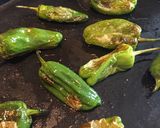 A picture of step 3 of Charred Padron Chilli Peppers.
