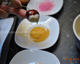 A picture of step 2 of White Chocolate dipped Cherries.