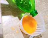 A picture of step 2 of Orange Mcfizzy Slushy🍹😋.