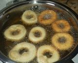 A picture of step 7 of Doughnuts #coastal coconut dish contest.