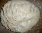 A picture of step 8 of Pumpkin shaped dinner rolls.
