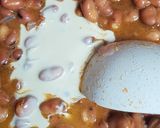 A picture of step 2 of Foul Mudammas with Tahini and Pomegranate Molasses.