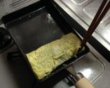 A picture of step 10 of Tamagoyaki (Japanese omelette).