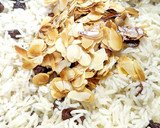 Foto del paso 4 de la receta: Arroz especiado con almendras y pasas