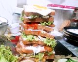 A picture of step 10 of Delicious tower sandwich.