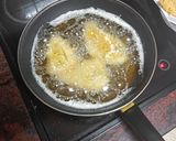 Foto del paso 8 de la receta Merluza frita con papas asadas y mojo de pimiento y tomate seco