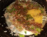 A picture of step 4 of Anda Bhurji.
