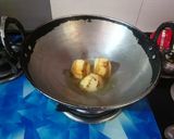 A picture of step 1 of Chicken Kosha 🍗.