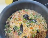 A picture of step 9 of Tomato rice in pan.