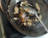 A picture of step 3 of Brinjal potato curry.