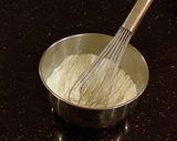 A picture of step 10 of Brownie Bottom Vanilla Butter Cake Cupcakes.