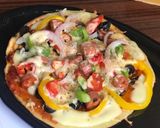 A picture of step 7 of Instant Rava pizza.