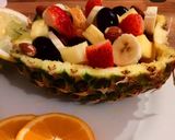 A picture of step 3 of Pineapple bowl fruit salad.