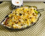 A picture of step 8 of Leftovers chikkar chanay biryani.