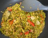 Foto langkah ke 8 dari resep Tumis Bunga Pepaya.