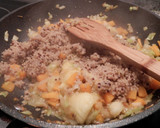 Foto del paso 4 de la receta: Calabacines rellenos de quinoa y verduras