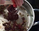Foto del paso 6 de la receta: Arroz integral meloso con pulpo y berberechos frescos