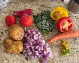 A picture of step 1 of Chicken veggie masala.
