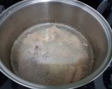 A picture of step 1 of Nam Ngiao (Northern Thai Pork Noodle Soup).