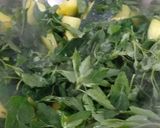 A picture of step 2 of Baby Pumpkin with Baathu leaves.