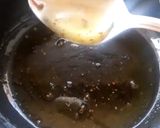 A picture of step 4 of Moong Dal Halwa Cigars dipped in Shaahi Rabdi.