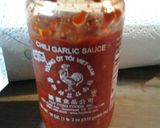 A picture of step 2 of Hotdog Egg rolls with sweet and spicy sauce.