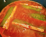 Foto del paso 5 de la receta: Calabacitas rellenas de queso, en caldillo de jitomate