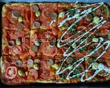 Une image de l'étape 19 de Pizza carrée, sauce tomate oignon 🍕.