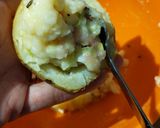 A picture of step 8 of "loaded" stuffed potato skins.