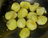 A picture of step 1 of Dum aloo.