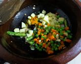A picture of step 3 of Mixed Vegetables Poha.