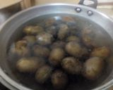 A picture of step 1 of Aloo Ka Bhurtha.