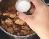 A picture of step 8 of Chicken hara masala.