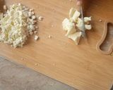 A picture of step 3 of Paneer chicken bread roll.