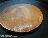 A picture of step 10 of Mango pancake with mango sauce.