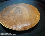 A picture of step 10 of Mango pancake with mango sauce.